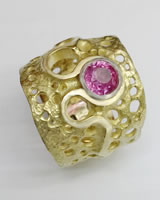 Extended 'Pierced Ring' with large pink Sapphire